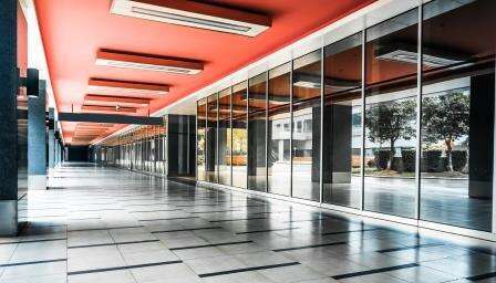 empty long corridor in the modern office building.